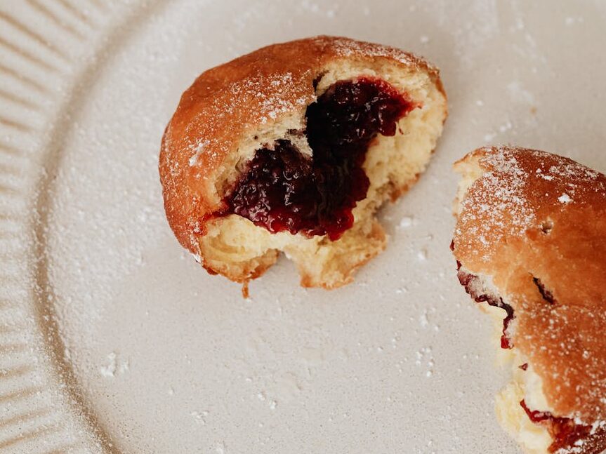 bread with jam on paper plate